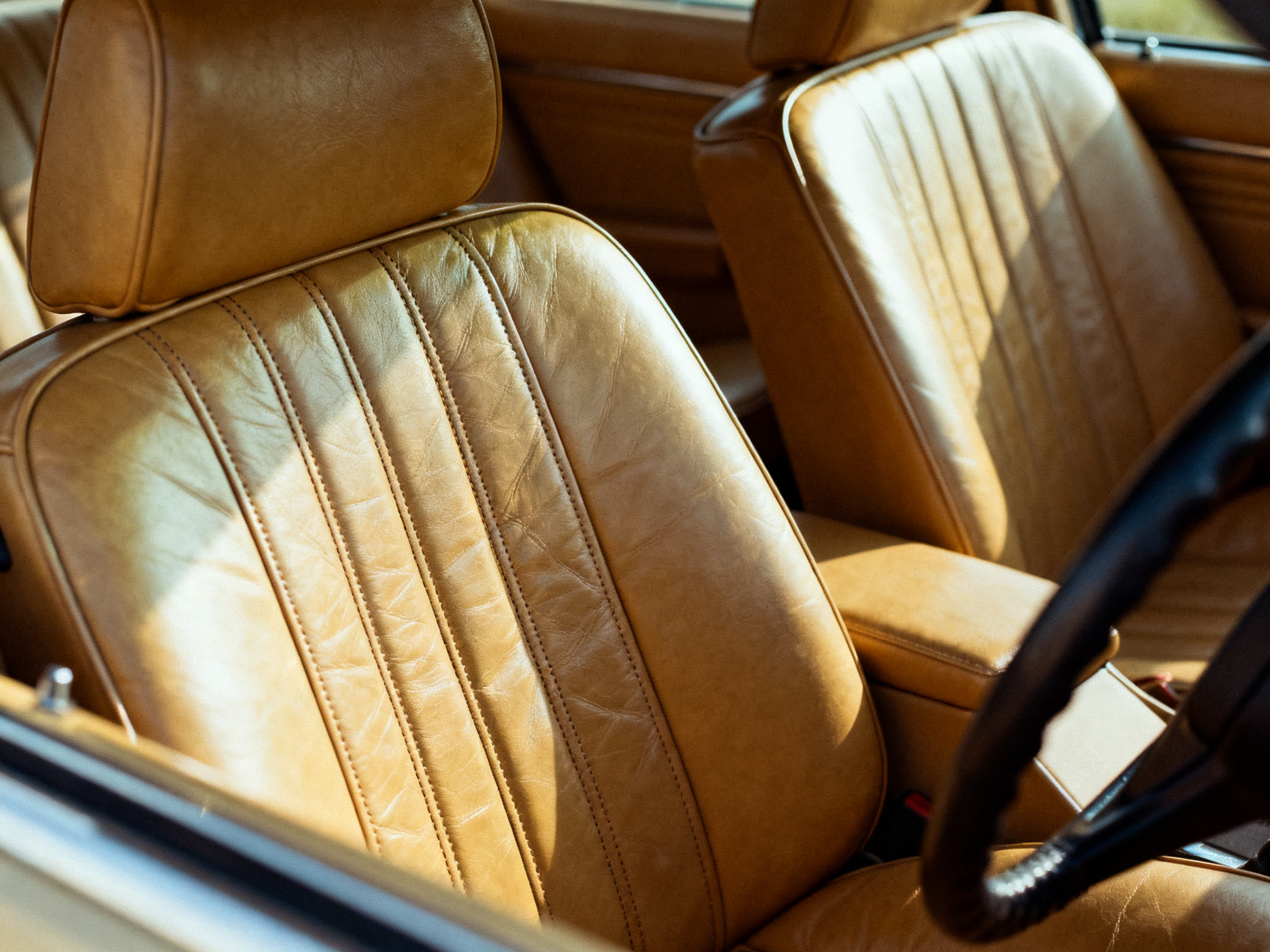 Tan leather car interior after detailing