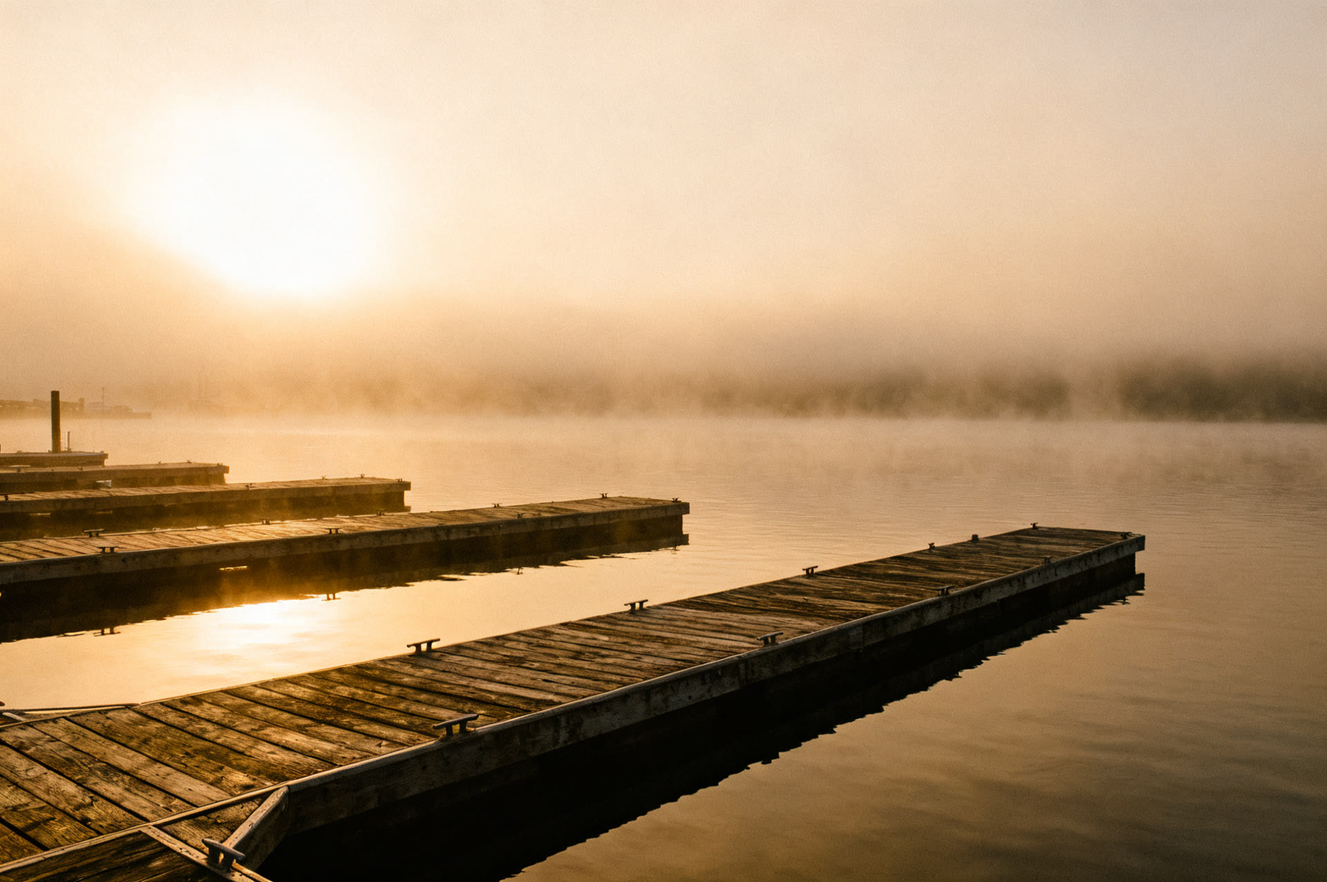 Empty marina slips at sunrise on Pewaukee Lake